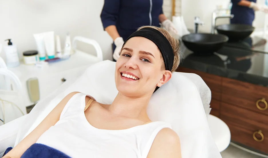 Relaxed client reclining in a treatment chair at a medical spa