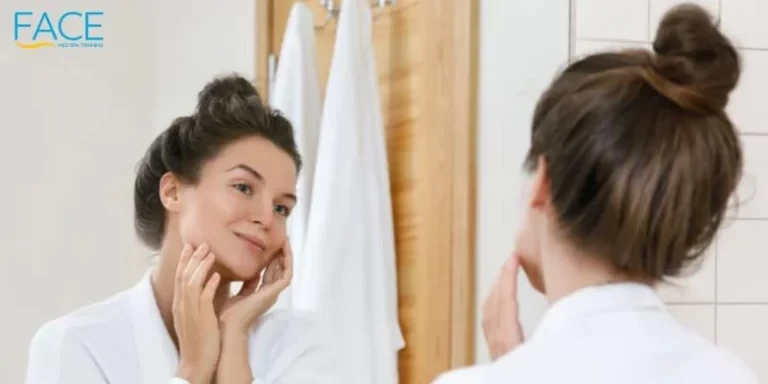 Young woman looking into the mirror