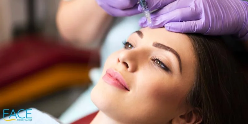 Young woman on a beauty treatment with the filler injection