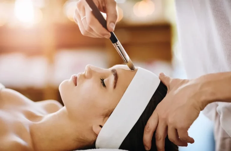 Shot of an attractive young woman getting a facial at a beauty spa