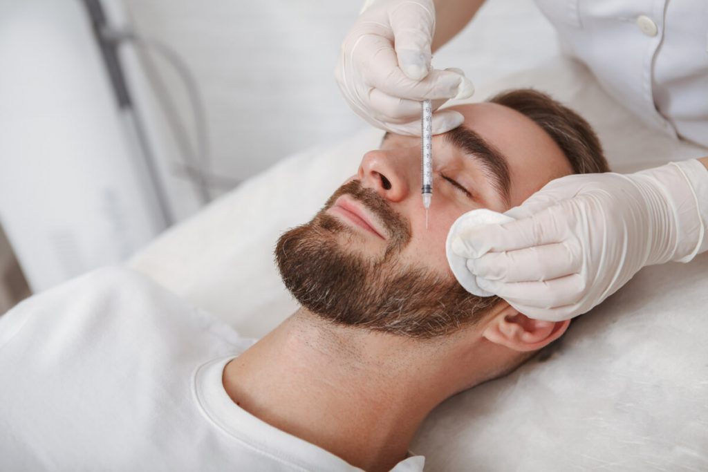 man receiving botox injection