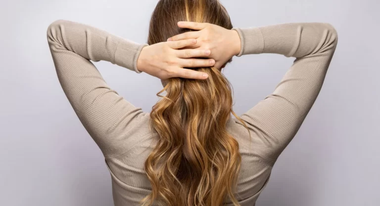 young woman showing her beautiful hair