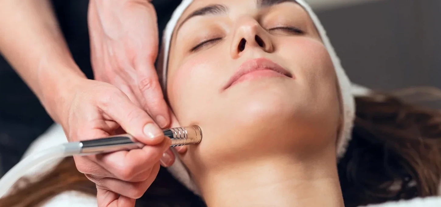 Woman's face getting a treatment