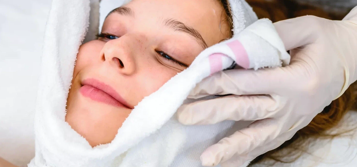 Woman's face getting treatment