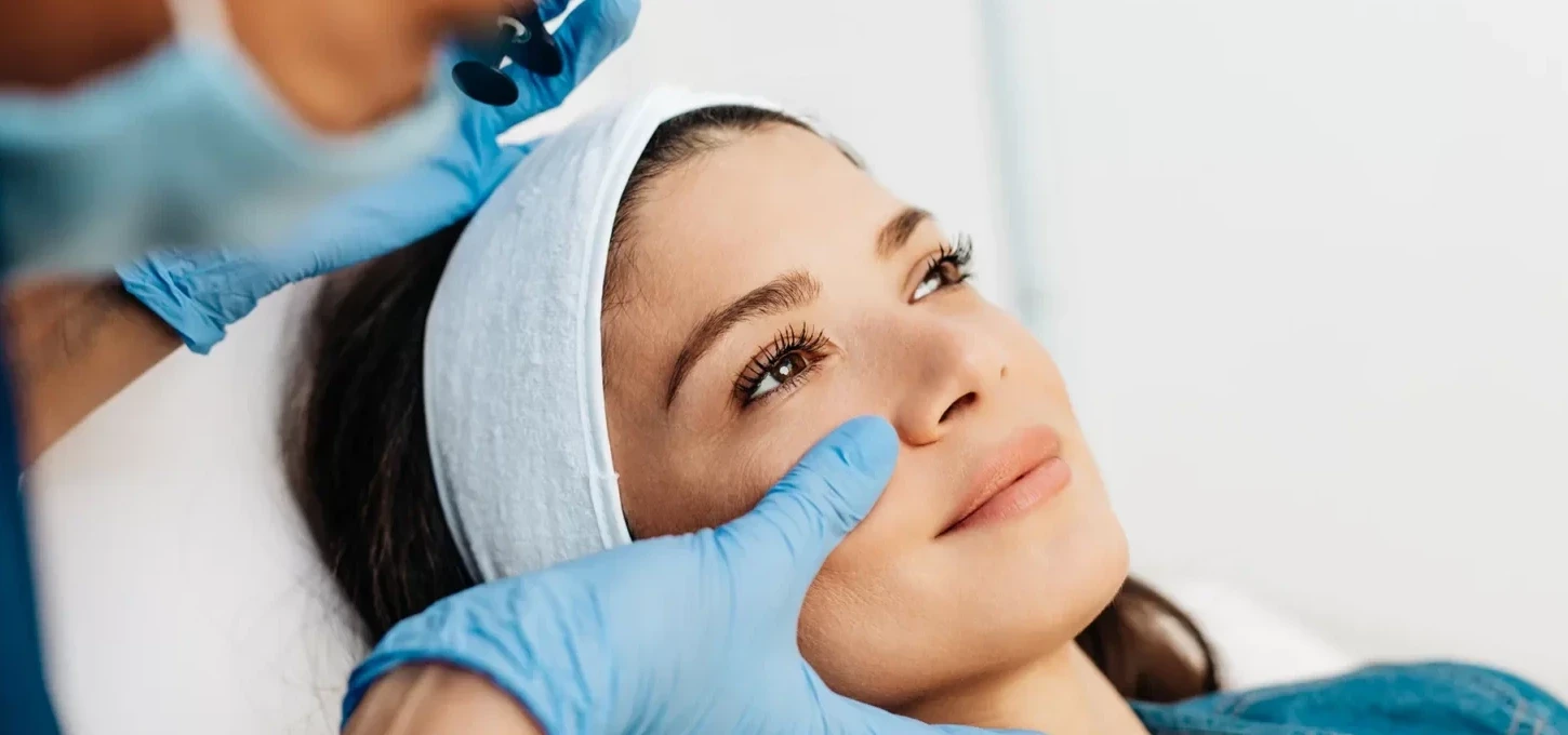 Woman's face getting a treatment