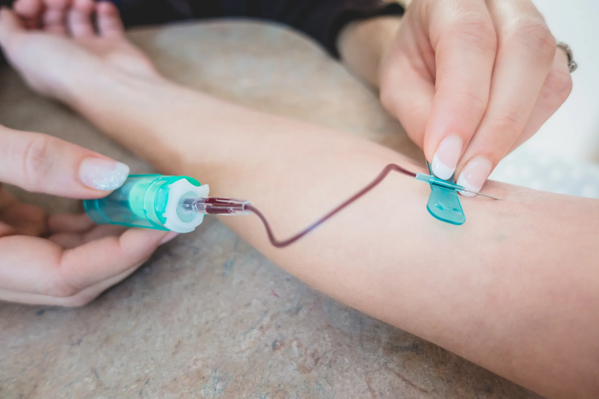 butterfly needle used in administering blood collection in a patient