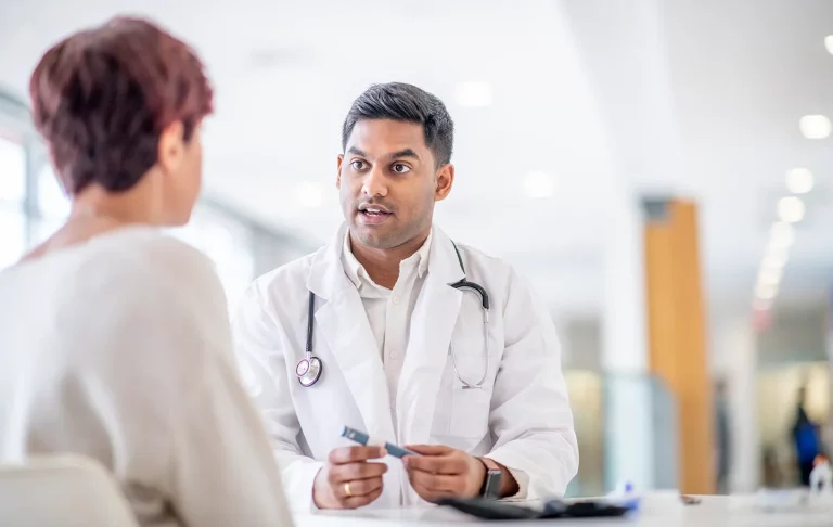 a patient consults her doctor with regards to diabetes treatments