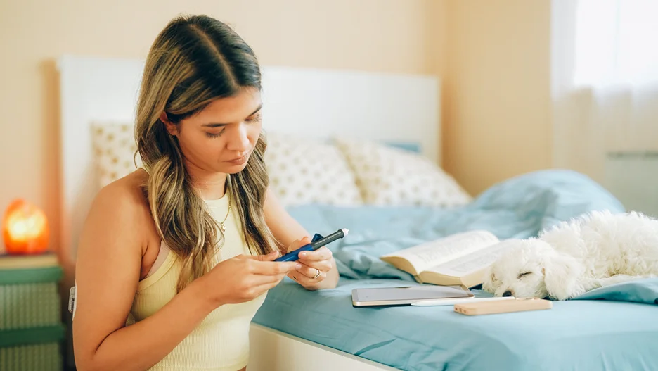 a woman checks her tirzepatide medication dosage