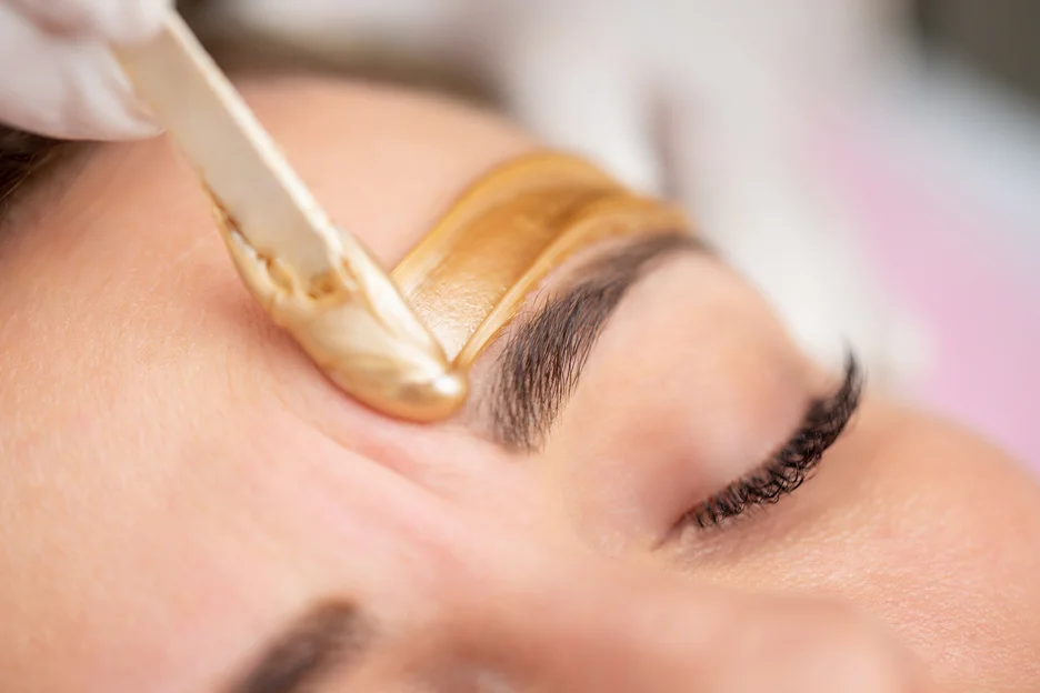 a portrait of a woman underwent waxing treatment 