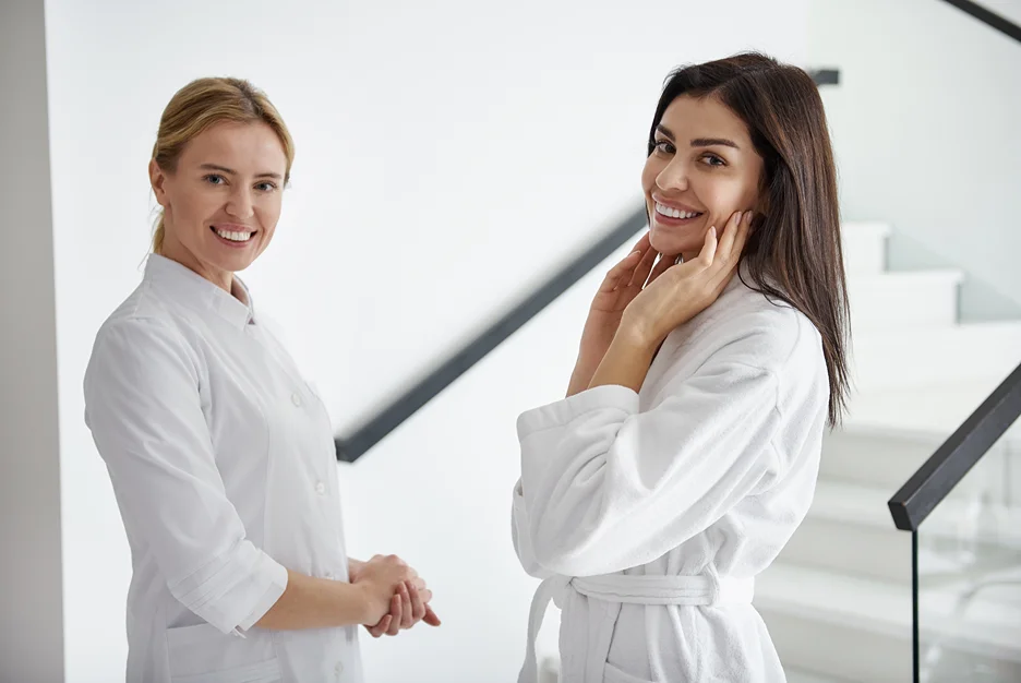 esthetician and her client inside the clinic