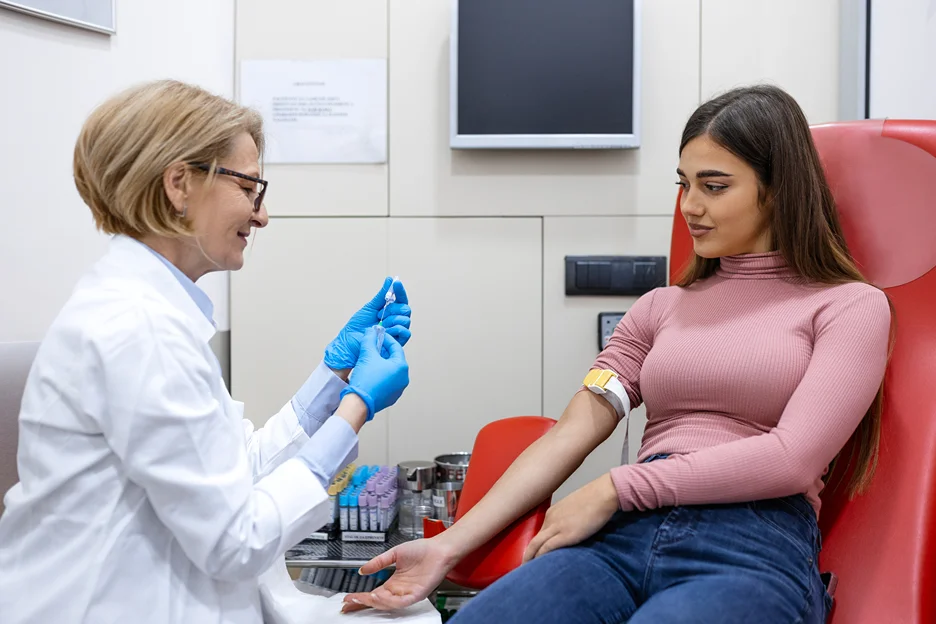 a doctor prepares for blood draw