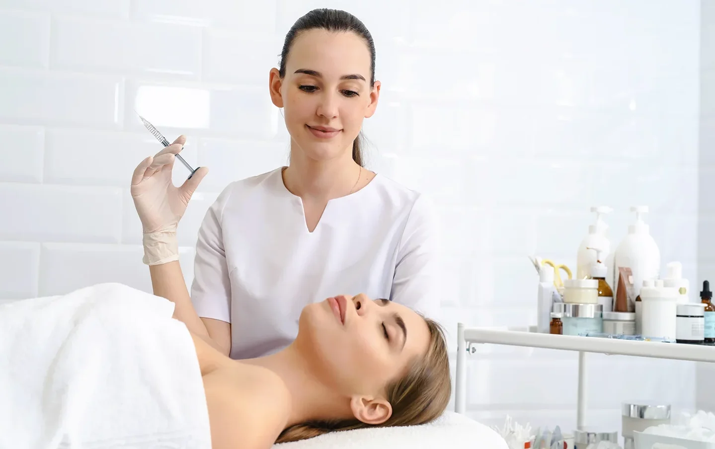 esthetician prepares Botox injection