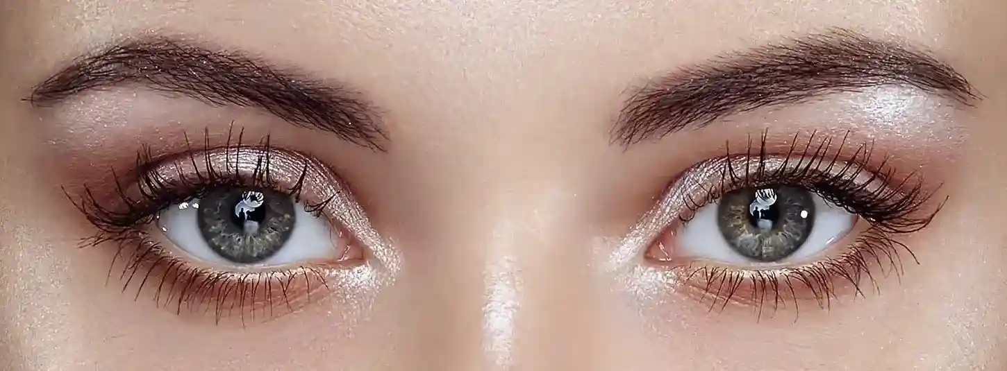 a portrait of a woman's bright eyes after using pdrn eye drop