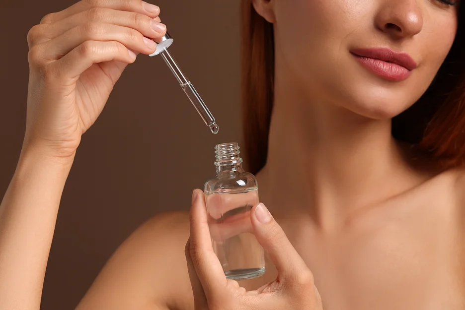 a woman applies salmon sperm serum