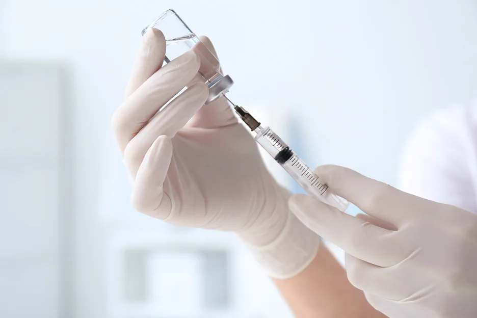 a med spa provider prepares pdrn skin booster injection before procedure