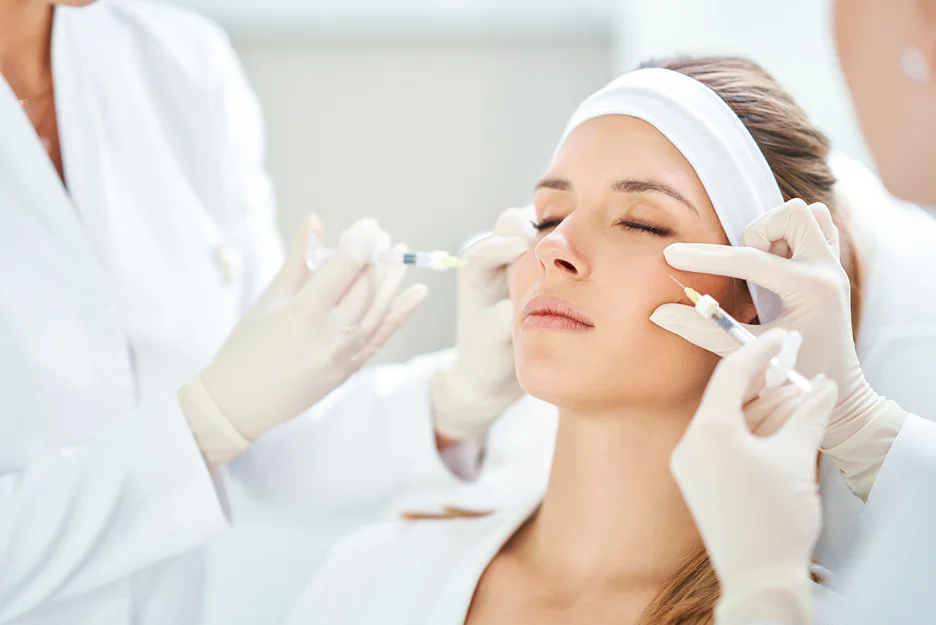 a med spa provider injects pdrn skin booster on the client's face