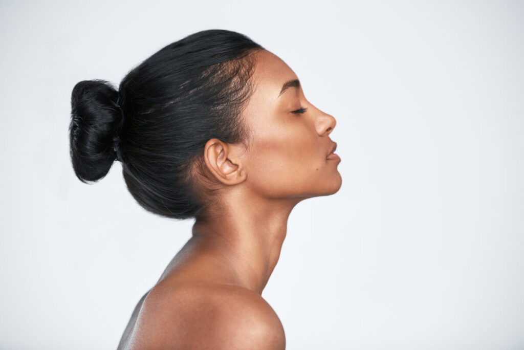 Shot of a beautiful young woman posing against a white background