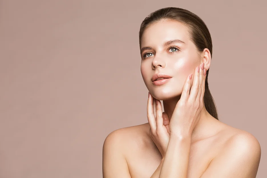 a woman with glowing skin
