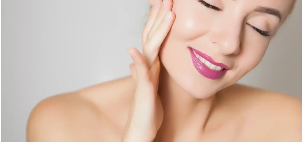 a portrait of a woman touching her face