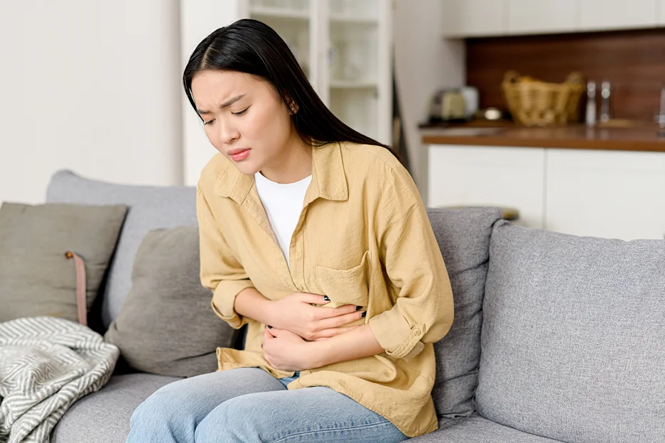 a woman has stomach upset symptom