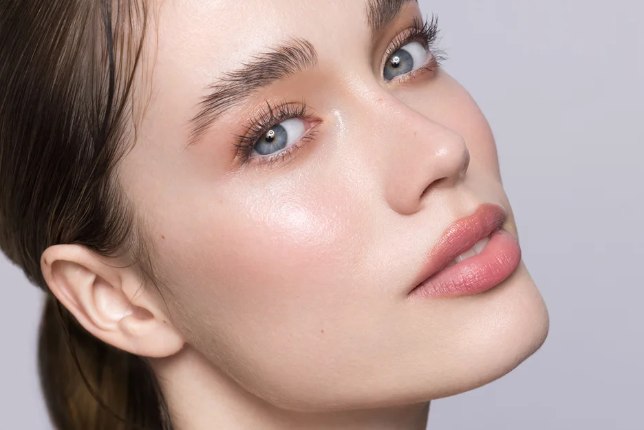 a woman with smooth under eyes after pdrn treatment
