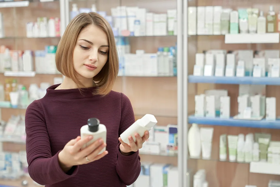 a woman choosing salmon sperm skin care